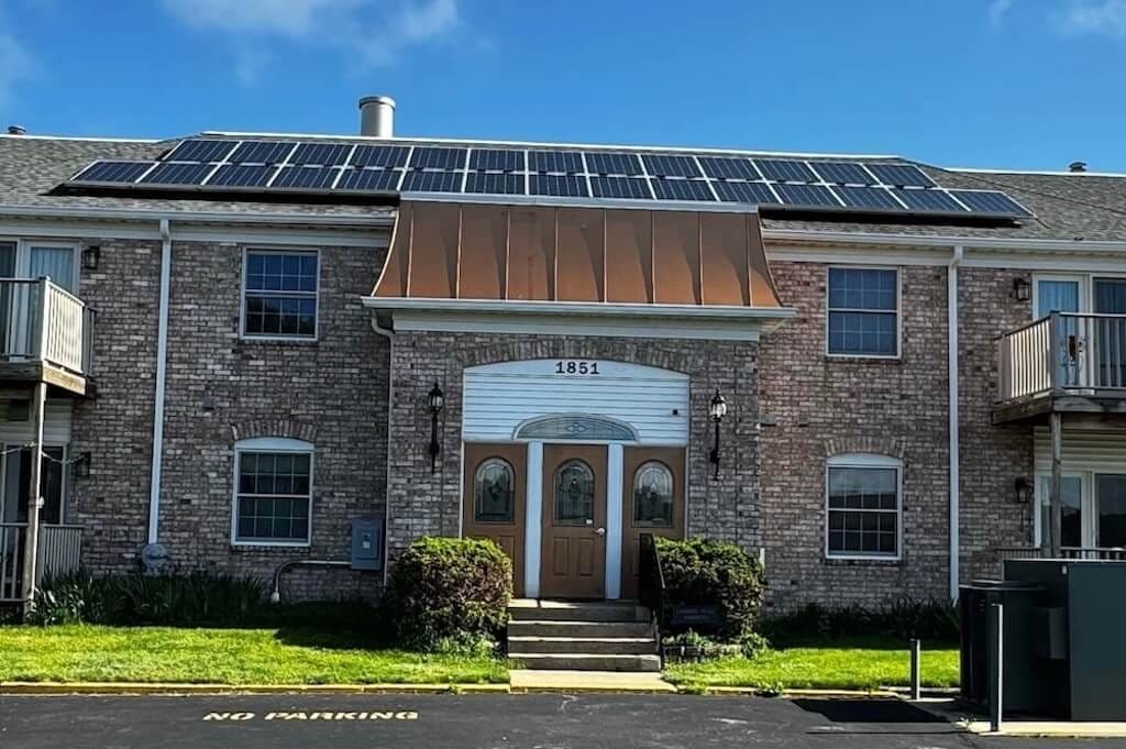 Cambridge Place Apts Iowa City front entryway with solar panels