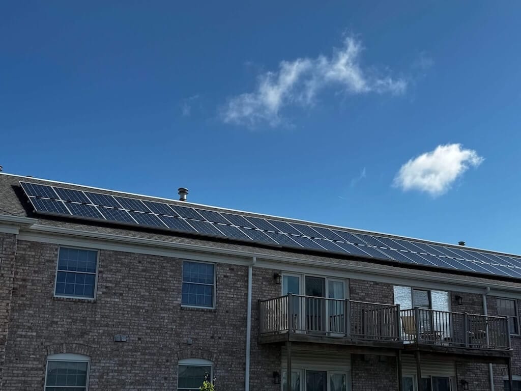 Sustainable apartment living in Iowa City powered in part by rooftop solar energy