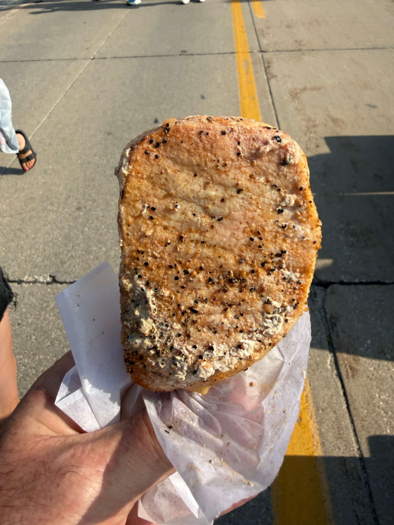 Pork Chop on a stick enjoyed during a RAGBRAI food stop
