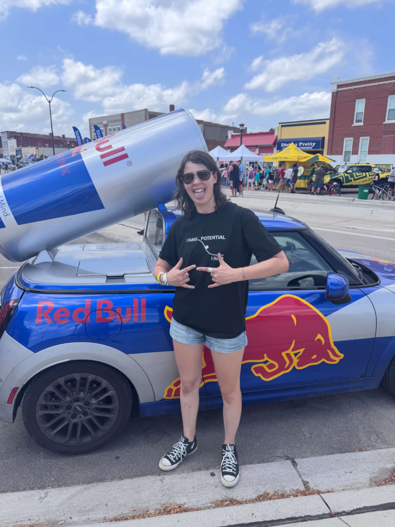 RAGBRAI support vehicles and cycling gear at an overnight stop in Iowa
